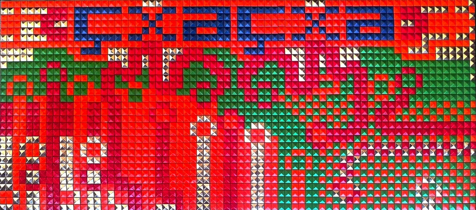 Detalle de los taches de un mosaico simbólico